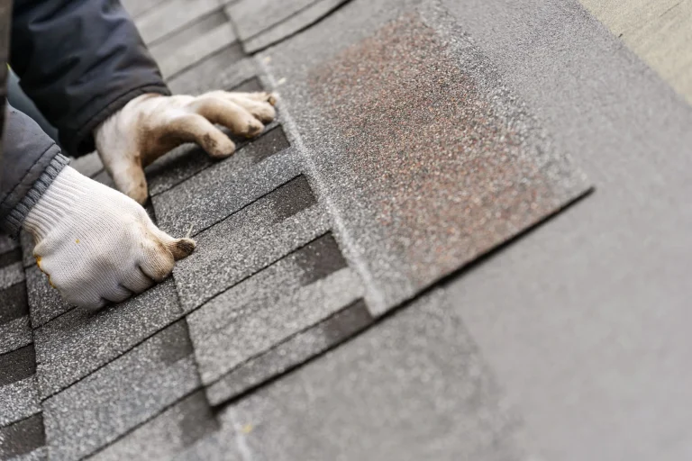 tile installation on roof of new house under construction Niles